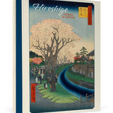 A boxed notecard assortment featuring an illustration of cherry blossoms by Hiroshige.