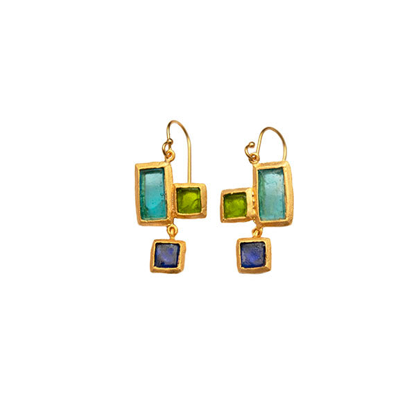 Gold earrings with green and blue gemstones on a white background