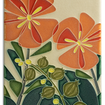 A rectangular ceramic tile with a floral pattern featuring orange and red flowers and green leaves.