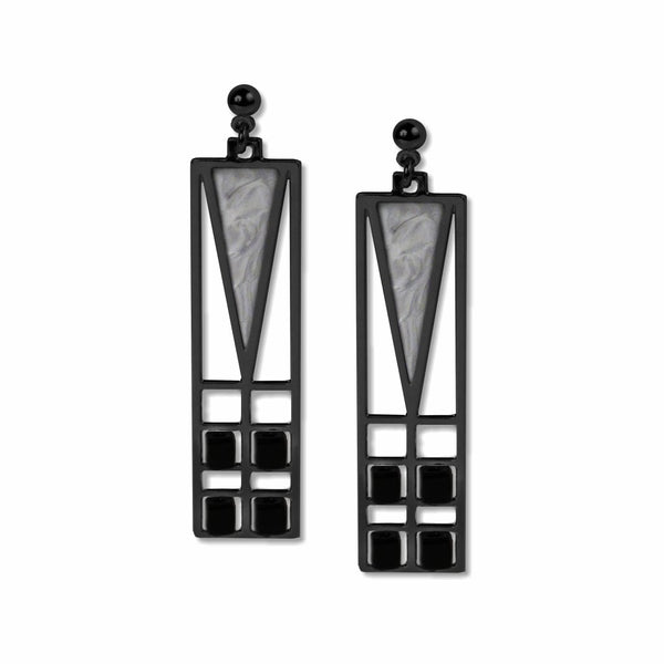 A pair of silver and black earrings with a geometric design, inspired by Frank Lloyd Wright's light screens from the Frank Thomas House.