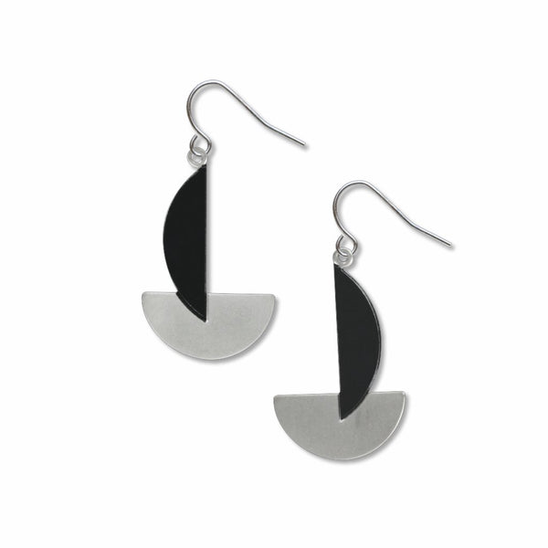 A pair of silver-colored earrings with a geometric shape, hanging from fishhook ear wires.