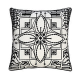 A square-shaped outdoor pillow with a geometric pattern featuring black and white colors and embroidered details.