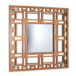 Square mirror with geometric wooden frame on a white background