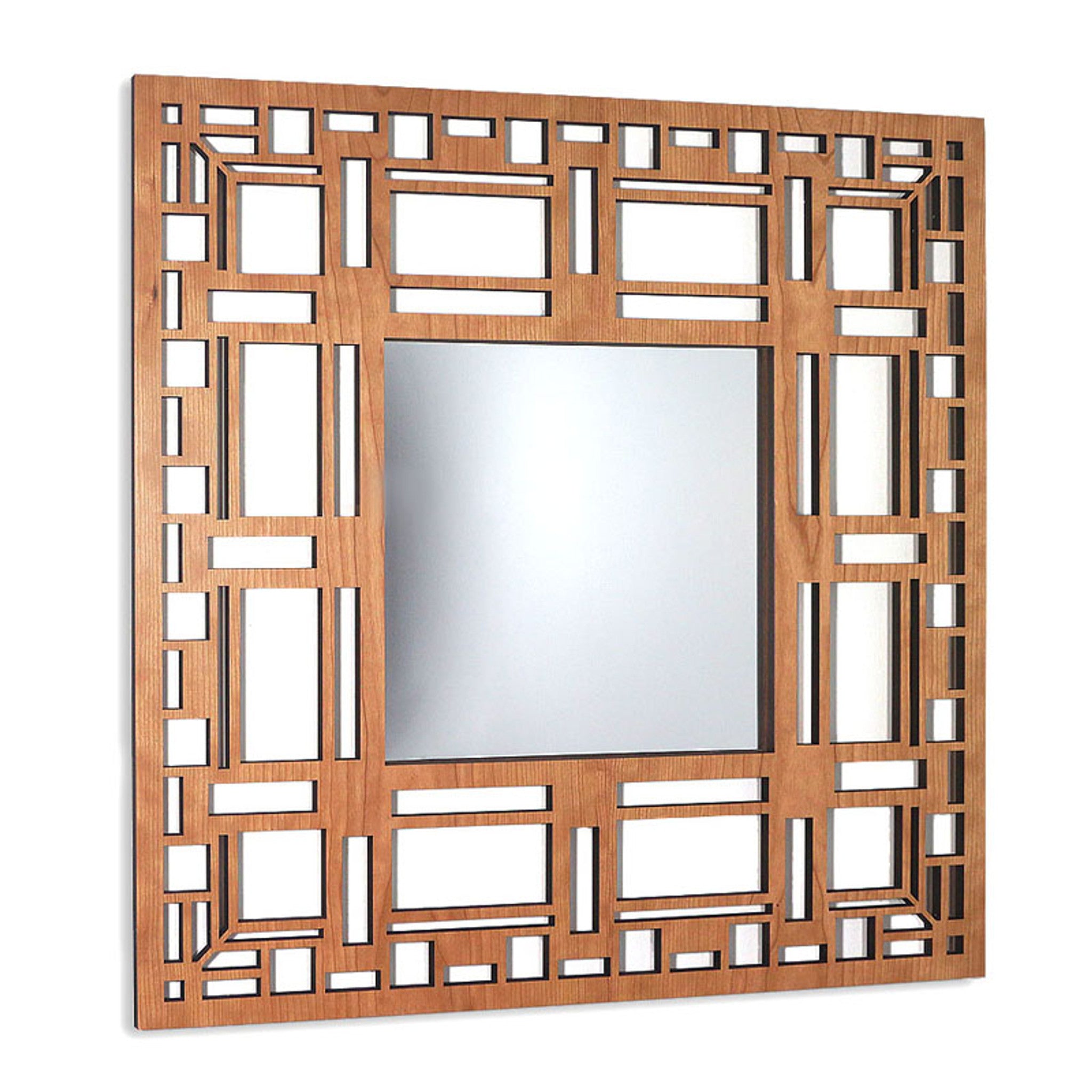 Square mirror with geometric wooden frame on a white background