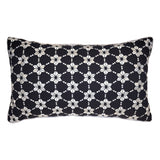 Decorative pillow with black and white geometric pattern on a white background
