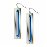 Silver earrings with blue rectangular stones on a white background
