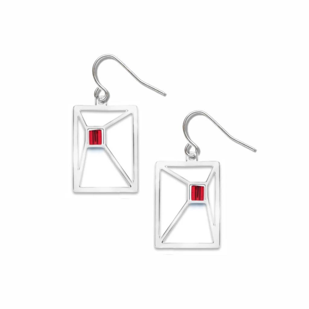 Silver earrings with red gemstones on a white background