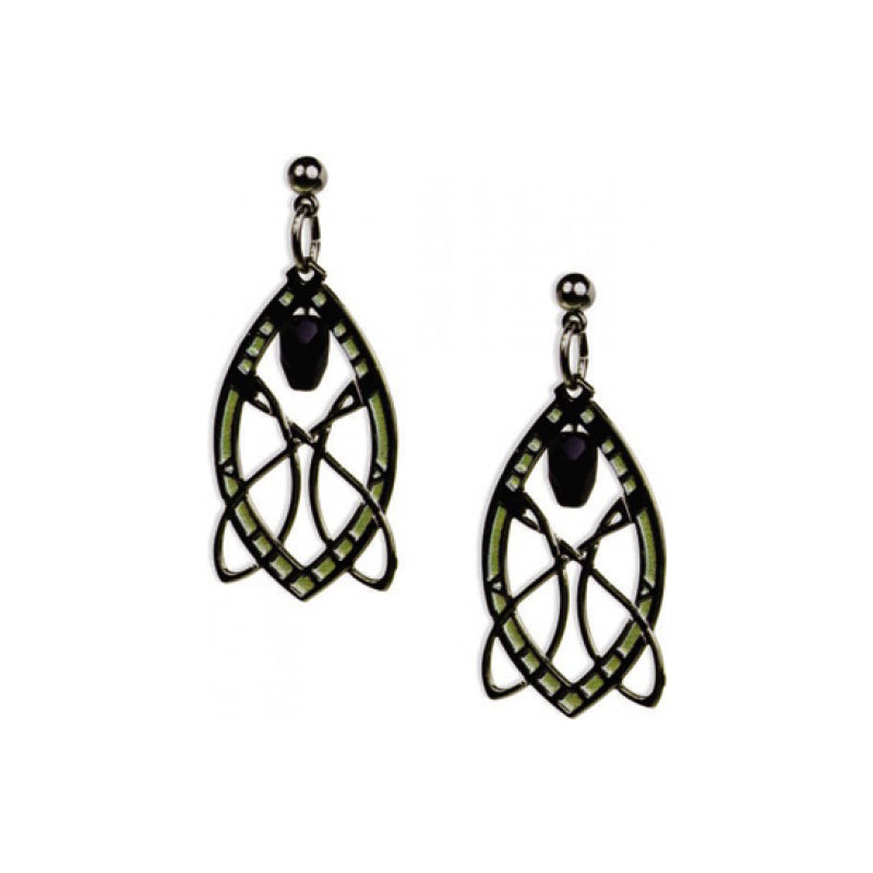 A pair of silver-colored, intricate patterned earrings hanging downwards, featuring green and black details within the design.