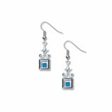 Pair of silver earrings with square gemstones on a white background