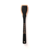 A black wooden serving paddle with a decorative gold pattern on the handle.