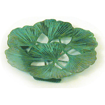 A decorative brass plate with a patina finish featuring a ginkgo leaf design, approximately 4.25 inches round.