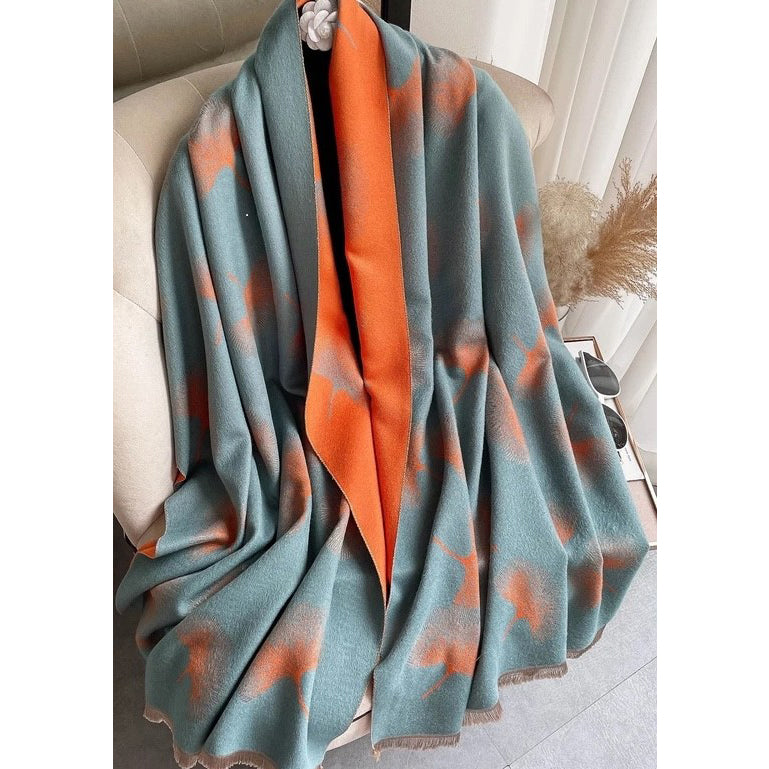 Blue and orange plaid scarf draped over a chair.