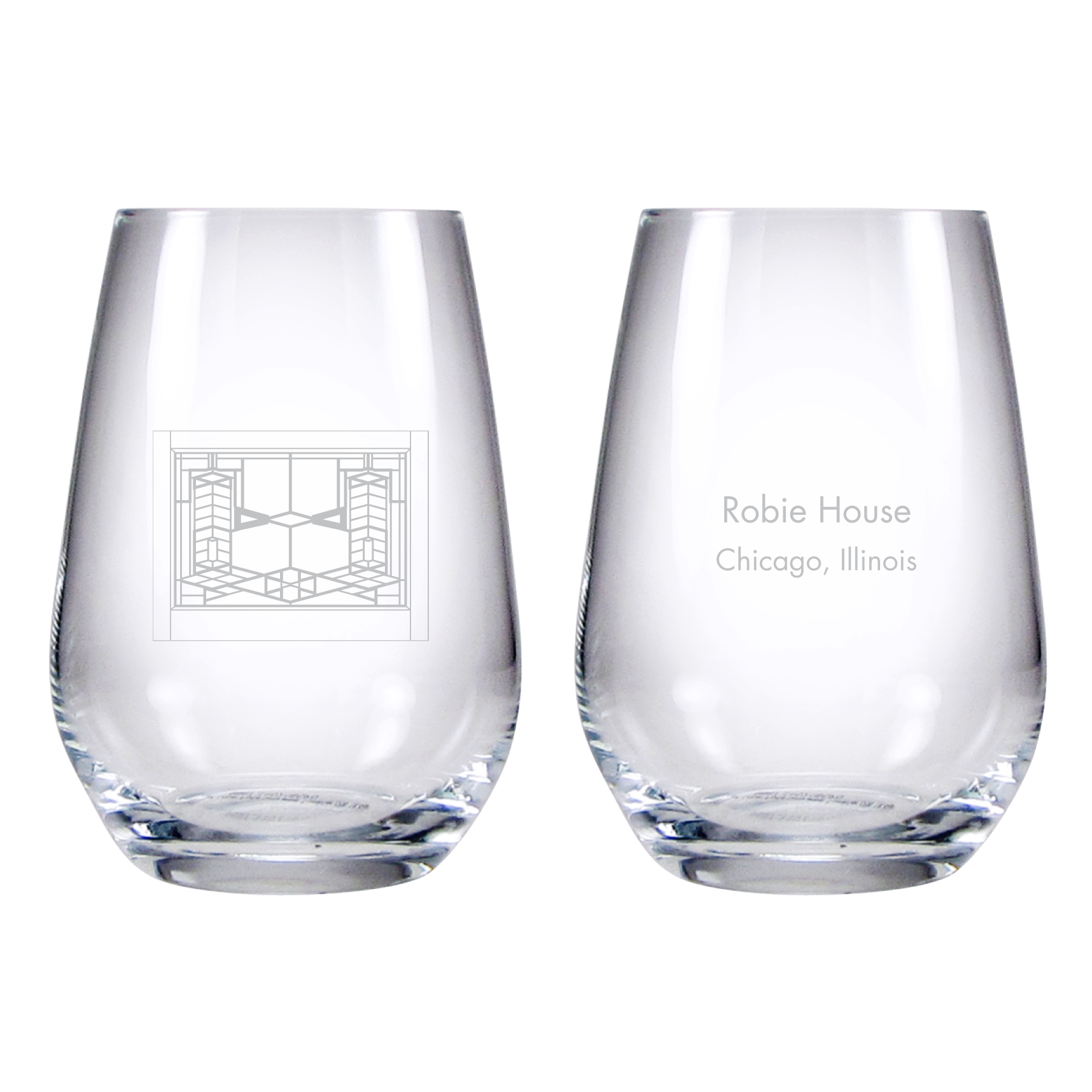 Two clear glasses with engraved text on a white background