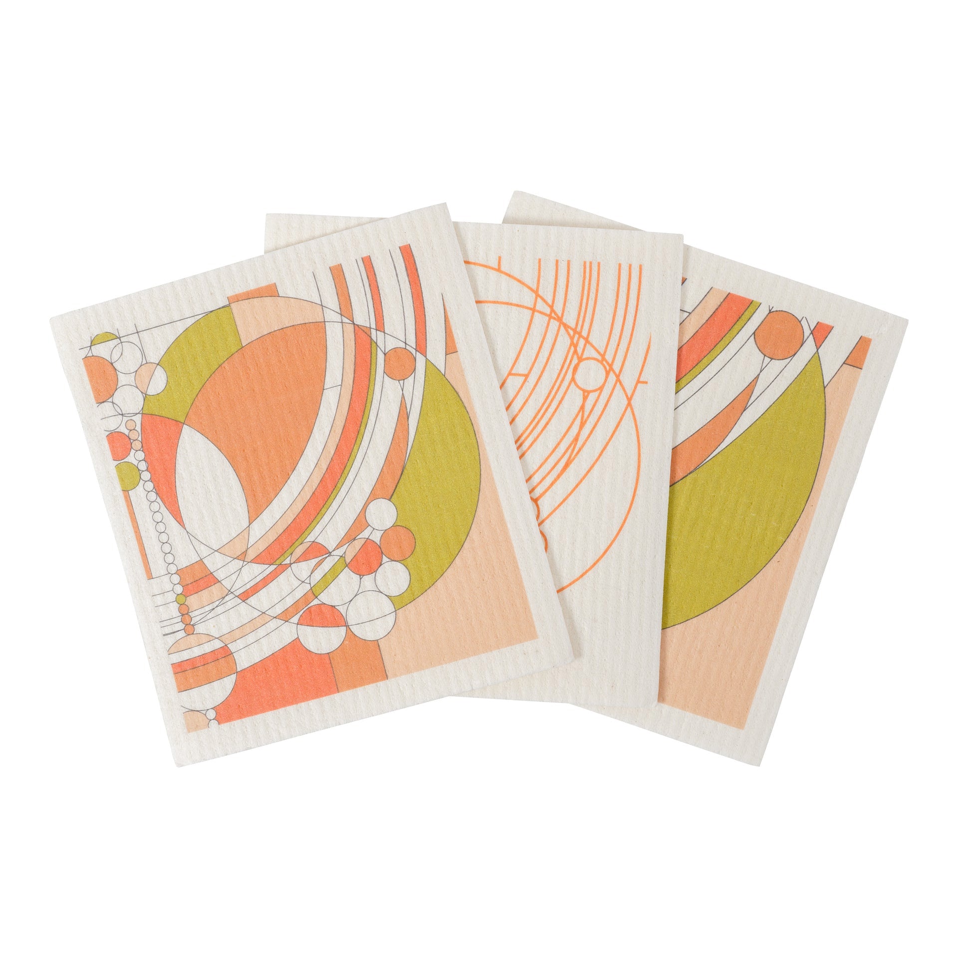 Three multicolored Swedish dish cloths with geometric patterns.