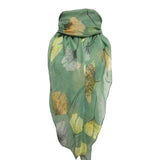 Green scarf with floral pattern on a white background