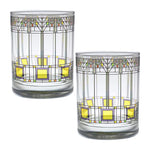 Two glass tumblers with geometric pattern on a white background