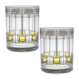 Two glass tumblers with geometric pattern on a white background