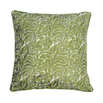 Green leaf patterned pillow on a white background