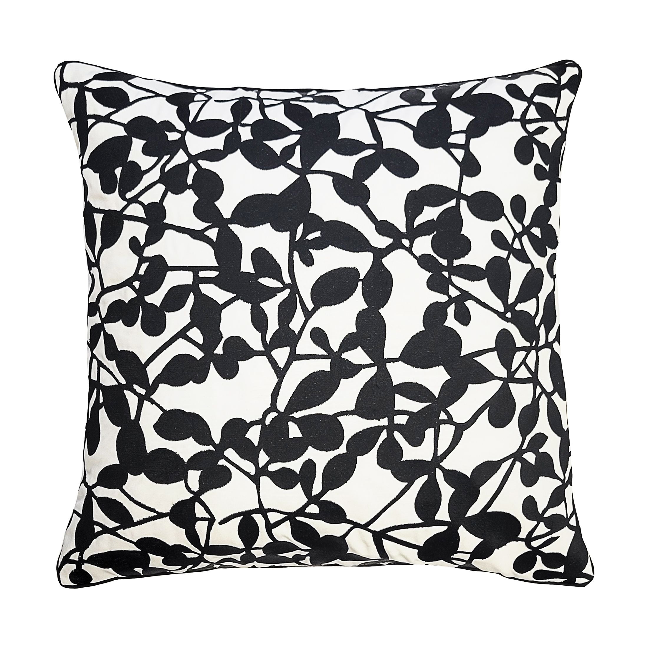Decorative pillow with black leaf pattern on a white background