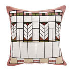 A square throw pillow with a geometric pattern inspired by Prairie style architecture, featuring a poly/cotton/acrylic blend front and a cotton back, in multiple colors including pink, white, green, brown, and beige.