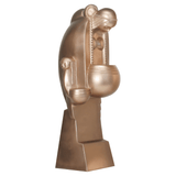 A bronze sculpture of a female figure with a round head and a round bowl, holding a papoose.