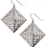 A pair of silver-colored wrought iron earrings with a stylized acanthus leaf design.